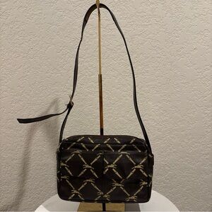 Longchamp Brown Leather
Crossbody